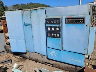 COMPRESSOR DE AR ESTACIONÁRIO ROTATIVO DE PARAFUSO ATLAS COPCO ZR 5A PACK, SÉRIE: PAU.3027, CAP.: 8.5 BAR (Ref.: MBV) — leilão em Belo Oriente/MG