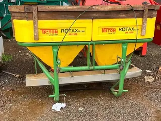 DISTRIBUIDOR DE ADUBOS/URÉIA E SEMENTES A CABO TRITON 1300KG - USADO — leilão em Cunha Porã/SC